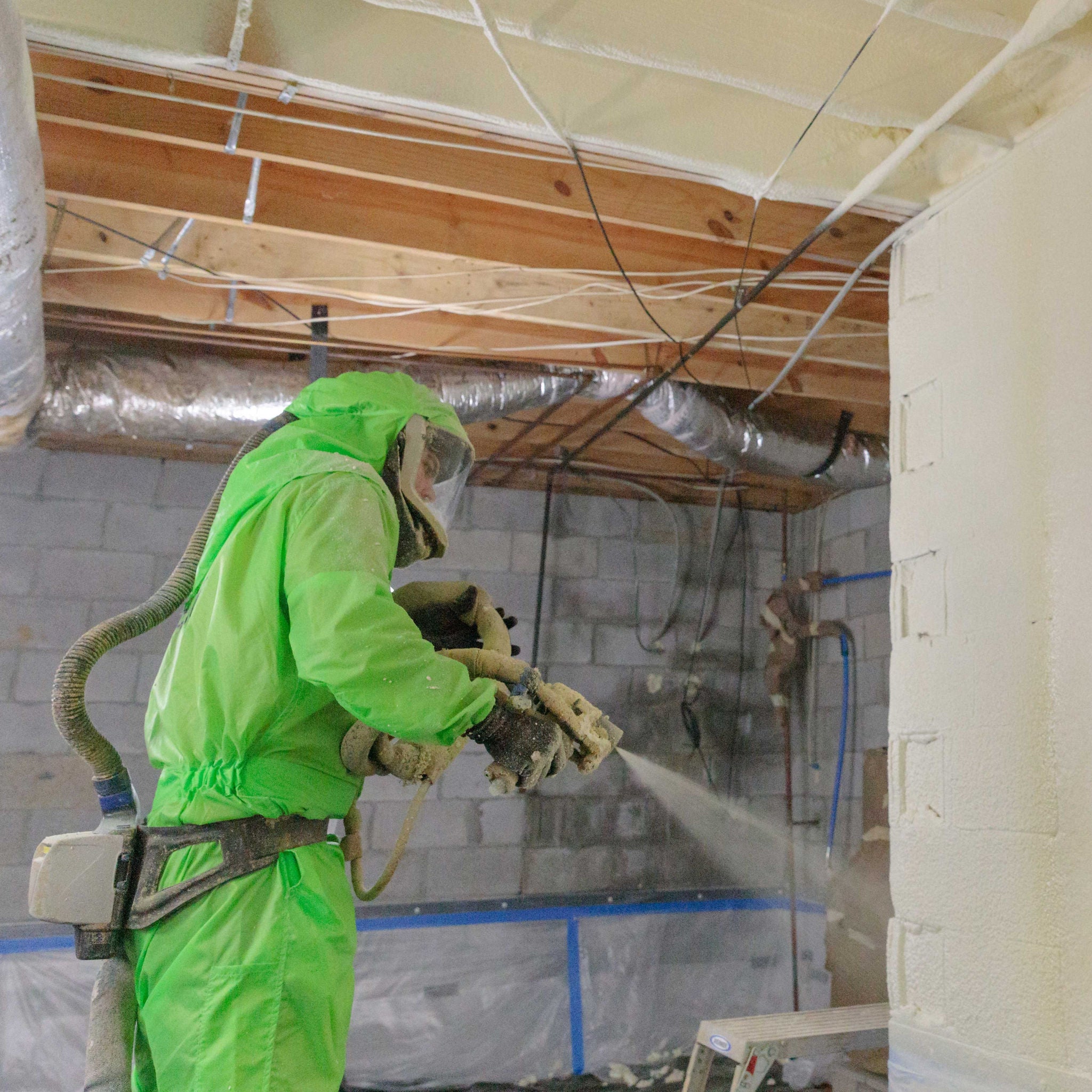 man spraying 