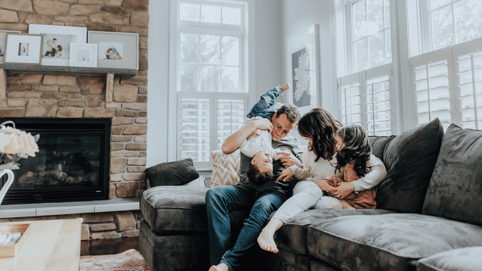Family on Couch - Home Owners